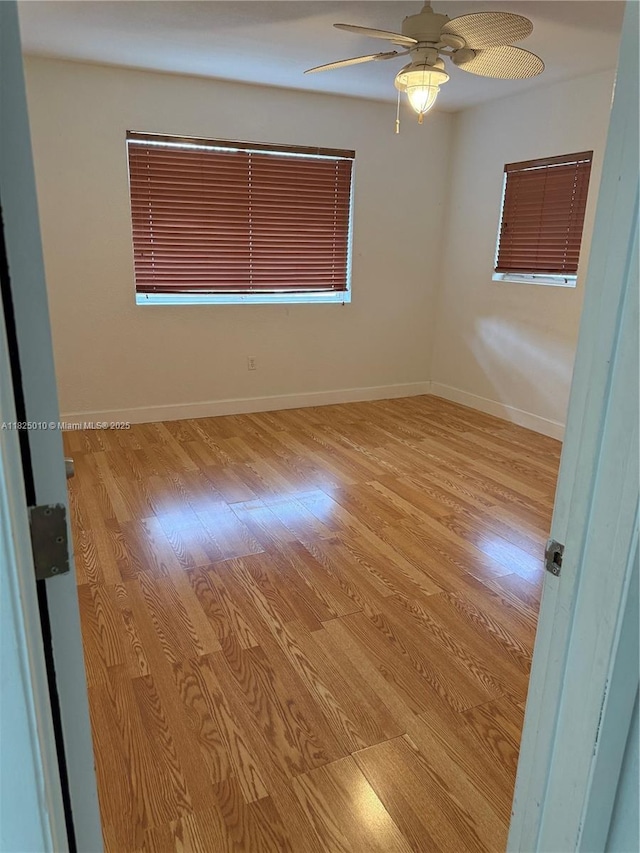 1142 99th St Unit 23, Bay Harbor Islands, FL 33154 - unfurnished room with light wood finished floors and ceiling fan