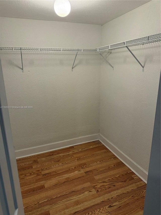 1142 99th St Unit 23, Bay Harbor Islands, FL 33154 - walk in closet with wood finished floors
