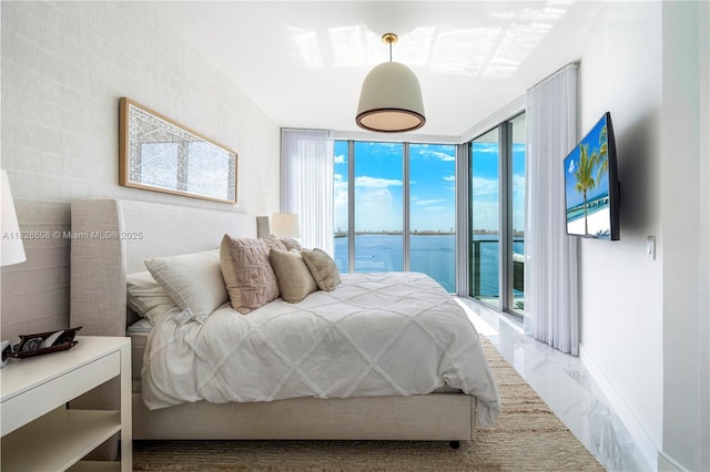 2900 NE 7th Ave Unit 2303, Miami, FL 33137 - bedroom with floor to ceiling windows, access to exterior, and marble finish floors