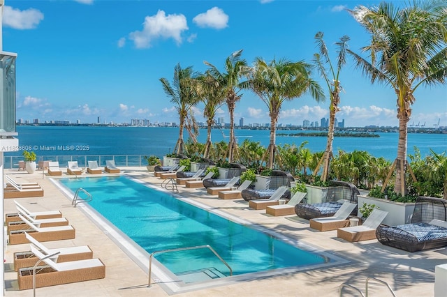 2900 NE 7th Ave Unit 2303, Miami, FL 33137 - community pool featuring a patio area, a water view, and a skyline view