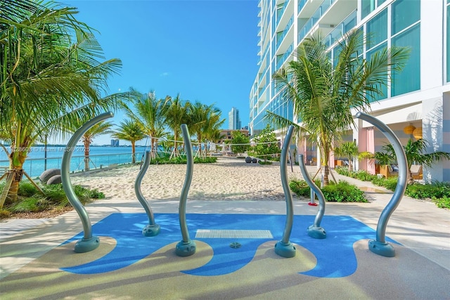 2900 NE 7th Ave Unit 2303, Miami, FL 33137 - view of property's community featuring volleyball court and a water view