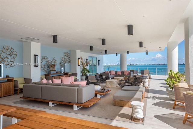 2900 NE 7th Ave Unit 2303, Miami, FL 33137 - view of patio with an outdoor hangout area and a water view