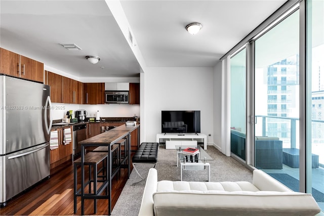 300 S Biscayne Blvd Unit T-1403, Miami, FL 33131 - living area featuring floor to ceiling windows and dark wood-style floors