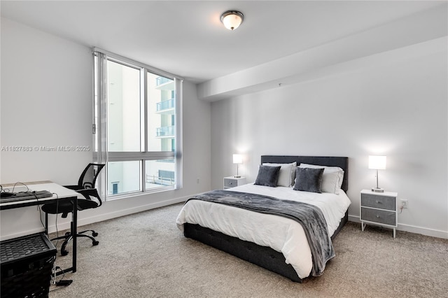 300 S Biscayne Blvd Unit T-1403, Miami, FL 33131 - carpeted bedroom featuring baseboards and an office area