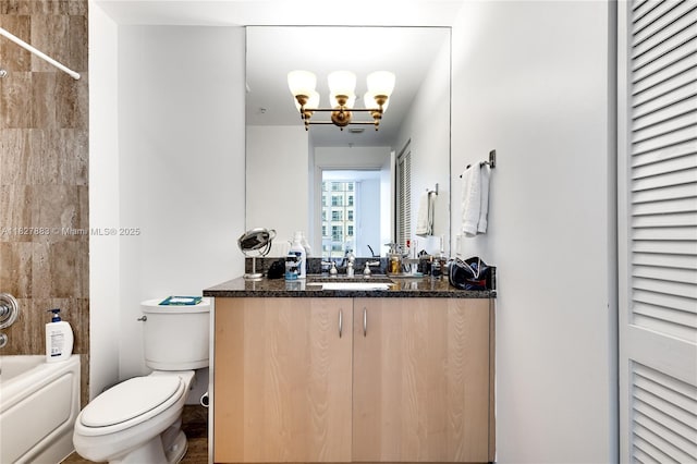 300 S Biscayne Blvd Unit T-1403, Miami, FL 33131 - bathroom featuring vanity, washtub / shower combination, a closet, and a chandelier