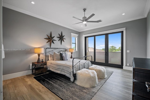 16675 C 24 Canal Rd, Port St Lucie, FL 34987 - bedroom featuring access to exterior, ornamental molding, wood finished floors, recessed lighting, and ceiling fan