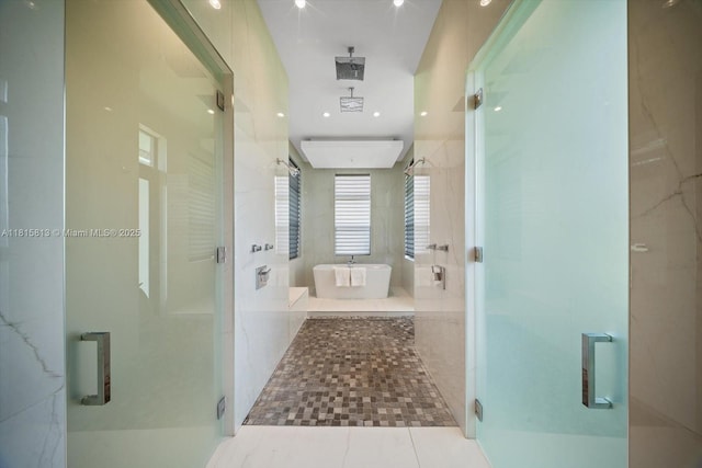 16675 C 24 Canal Rd, Port St Lucie, FL 34987 - full bath with a stall shower and a soaking tub
