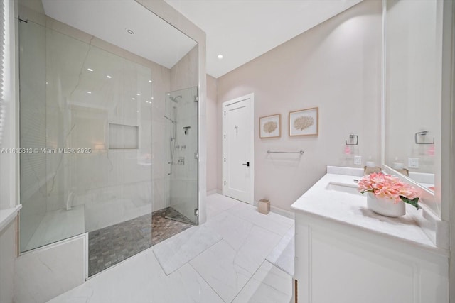 16675 C 24 Canal Rd, Port St Lucie, FL 34987 - bathroom featuring a marble finish shower, vanity, marble finish floors, and recessed lighting
