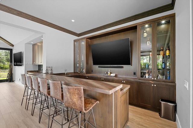 16675 C 24 Canal Rd, Port St Lucie, FL 34987 - indoor wet bar featuring baseboards and light wood finished floors