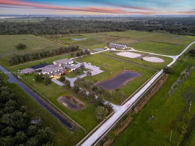 16675 C 24 Canal Rd, Port St Lucie, FL 34987 - aerial view at dusk of a water view and a view of rural / pastoral area