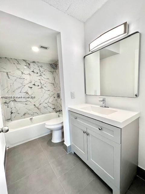 2020 NE 135th St Unit 407, North Miami, FL 33181 - full bathroom with vanity, washtub / shower combination, tile patterned floors, and a textured ceiling