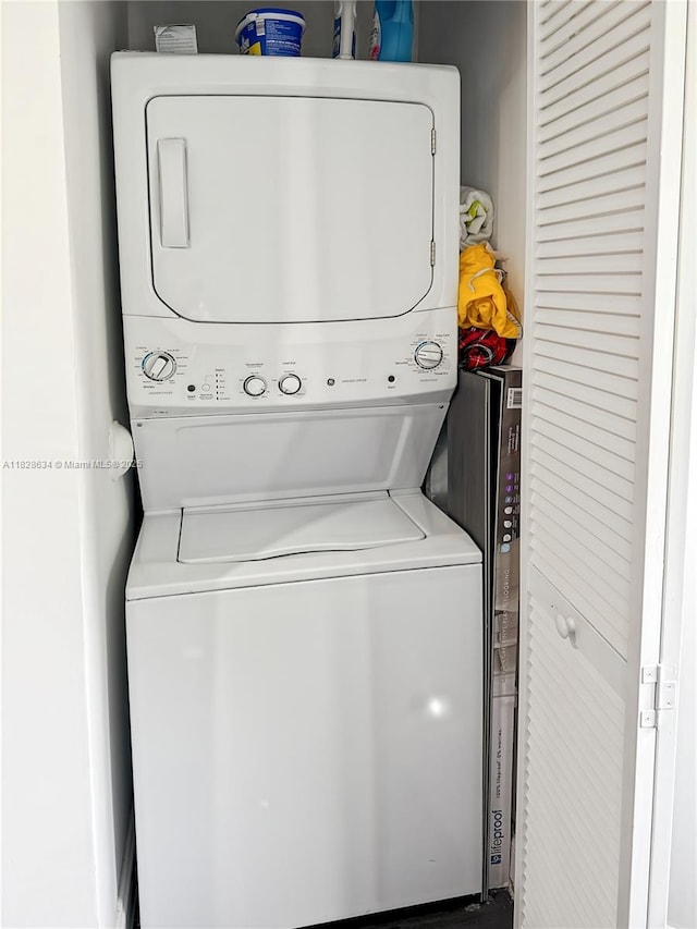 22551 SW 88th Pl Unit 205, Cutler Bay, FL 33190 - laundry area with stacked washer / dryer