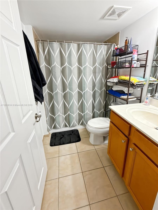 22551 SW 88th Pl Unit 205, Cutler Bay, FL 33190 - bathroom with vanity, tile patterned floors, and curtained shower