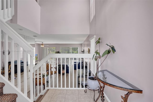 15827 NW 4th Ct, Pembroke Pines, FL 33028 - stairs with ceiling fan, tile patterned flooring, and a towering ceiling