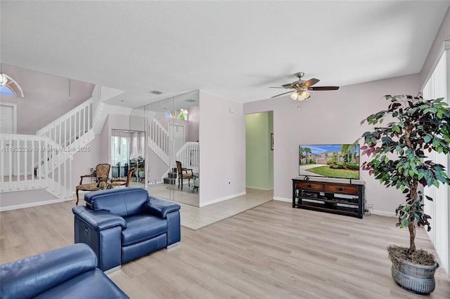 15827 NW 4th Ct, Pembroke Pines, FL 33028 - living room featuring stairs, light wood-style flooring, and ceiling fan