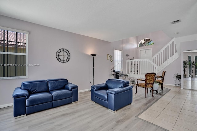 15827 NW 4th Ct, Pembroke Pines, FL 33028 - living area featuring stairway, wood finished floors, and plenty of natural light