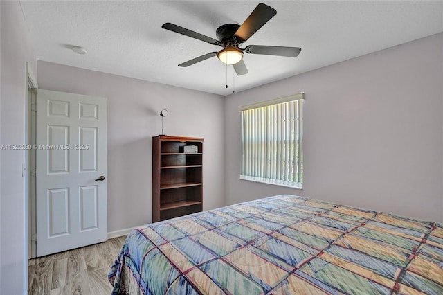 15827 NW 4th Ct, Pembroke Pines, FL 33028 - bedroom with light wood-style flooring and a ceiling fan
