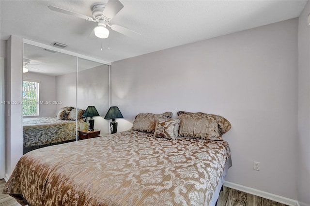 15827 NW 4th Ct, Pembroke Pines, FL 33028 - bedroom with wood finished floors, a ceiling fan, and a closet