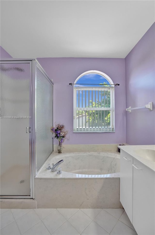 15827 NW 4th Ct, Pembroke Pines, FL 33028 - bathroom with vanity, a bath, a shower stall, and tile patterned flooring