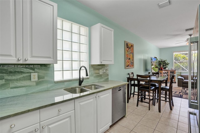 15827 NW 4th Ct, Pembroke Pines, FL 33028 - kitchen featuring dishwasher, tasteful backsplash, white cabinetry, light tile patterned floors, and a ceiling fan