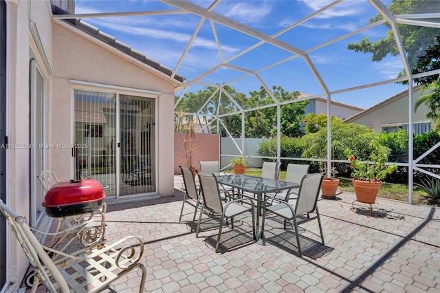 15827 NW 4th Ct, Pembroke Pines, FL 33028 - view of patio with glass enclosure, outdoor dining space, and grilling area