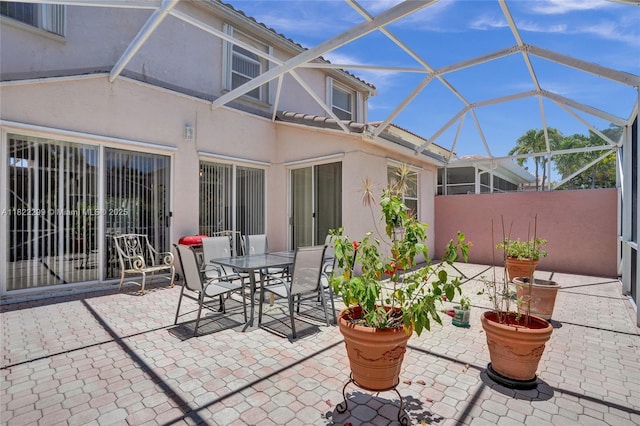 15827 NW 4th Ct, Pembroke Pines, FL 33028 - view of patio / terrace with outdoor dining space and glass enclosure