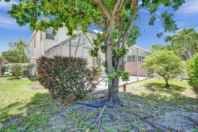 15827 NW 4th Ct, Pembroke Pines, FL 33028 - view of grassy yard featuring a lanai and a patio area