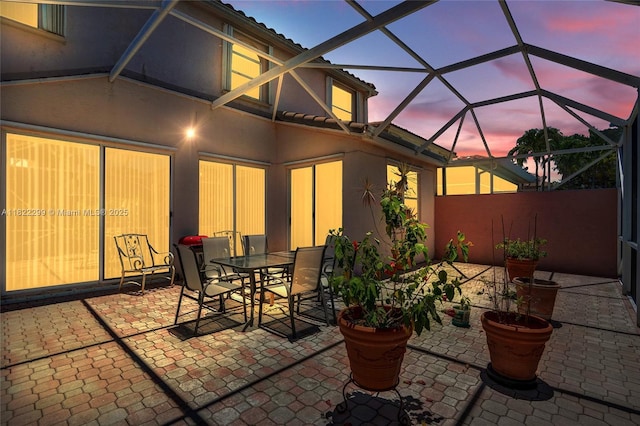 15827 NW 4th Ct, Pembroke Pines, FL 33028 - view of patio with outdoor dining space and glass enclosure