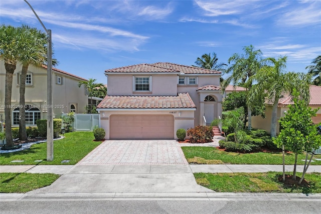 15827 NW 4th Ct, Pembroke Pines, FL 33028 - mediterranean / spanish-style house with a tile roof, a garage, stucco siding, and driveway