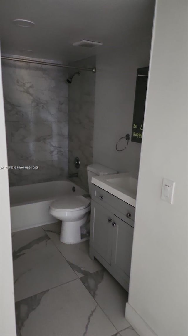 14902 SW 82nd Ln Unit 13-101, Miami, FL 33193 - bathroom featuring marble finish floors, vanity, and washtub / shower combination