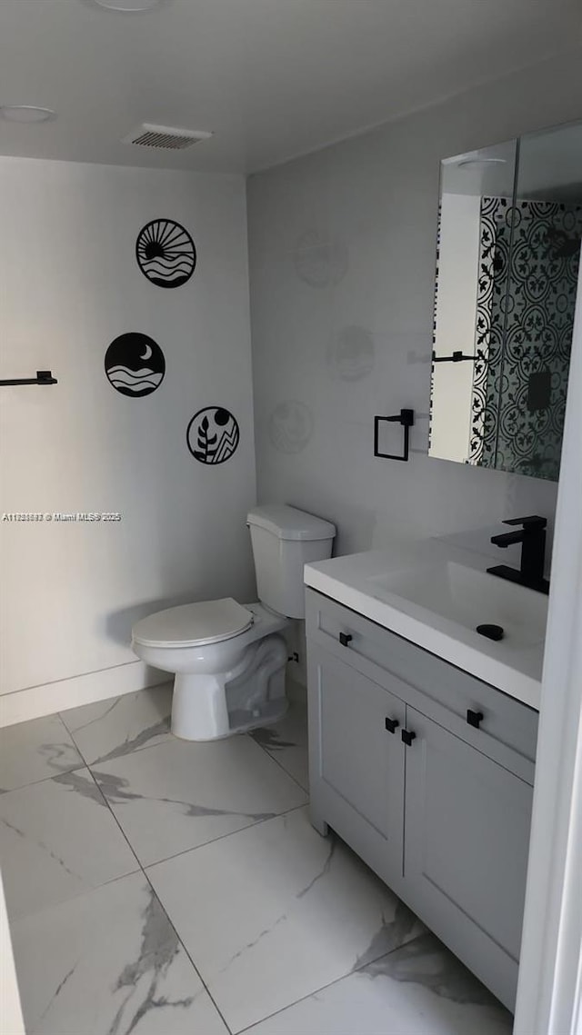 14902 SW 82nd Ln Unit 13-101, Miami, FL 33193 - bathroom featuring vanity and marble finish floors