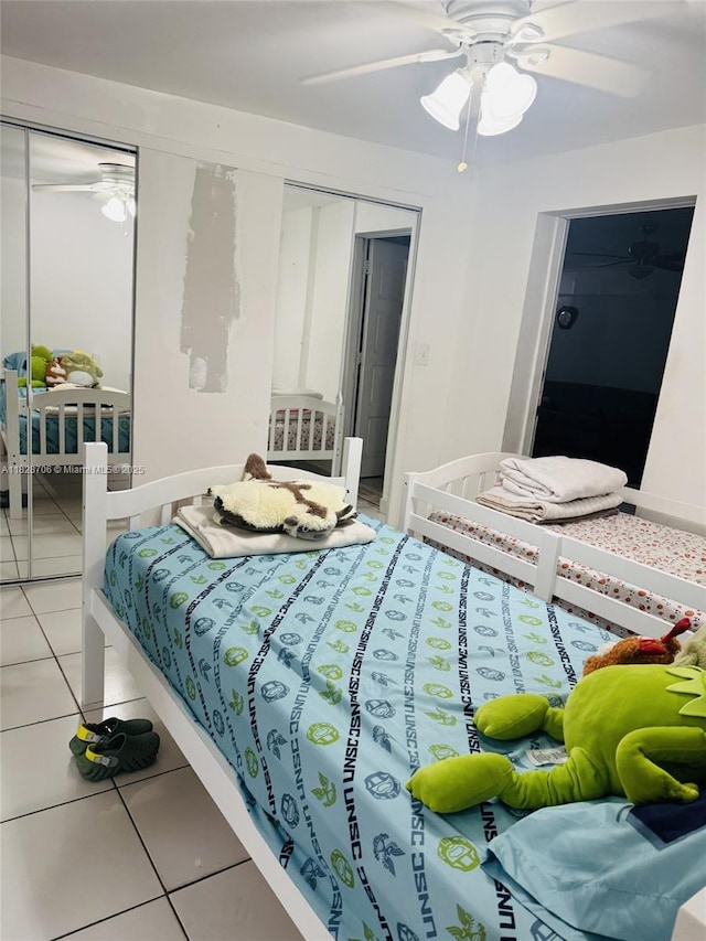 3915 NW 4th Ter, Miami, FL 33126 - bedroom featuring light tile patterned floors, ceiling fan, and a closet