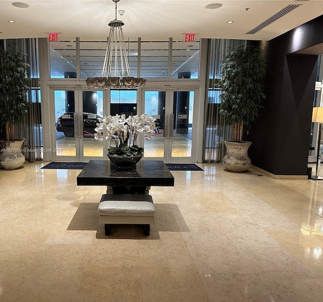 60 SW 13th St Unit 2824, Miami, FL 33130 - lobby featuring expansive windows and recessed lighting