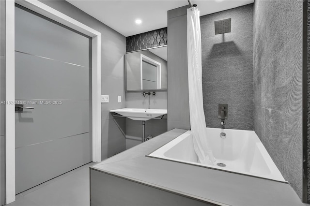 725 NE 22nd St Unit 16A, Miami, FL 33137 - full bath with shower / tub combo and tile walls
