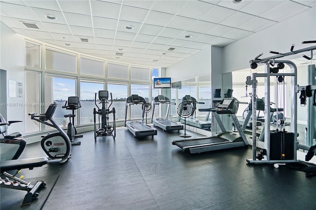 725 NE 22nd St Unit 16A, Miami, FL 33137 - workout area featuring expansive windows and a paneled ceiling