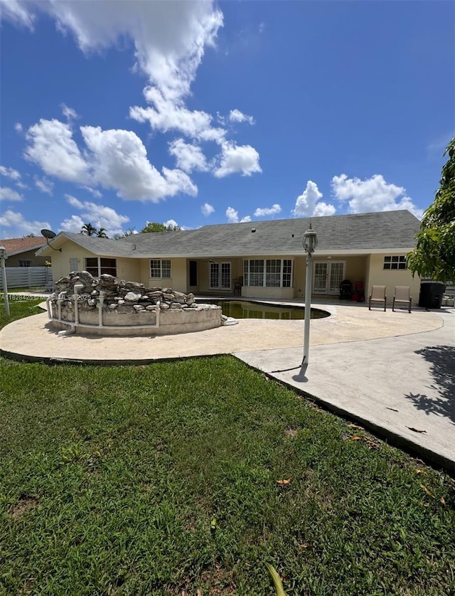 14603 SW 152nd Ct, Miami, FL 33196 - back of house featuring a patio area, french doors, and stucco siding