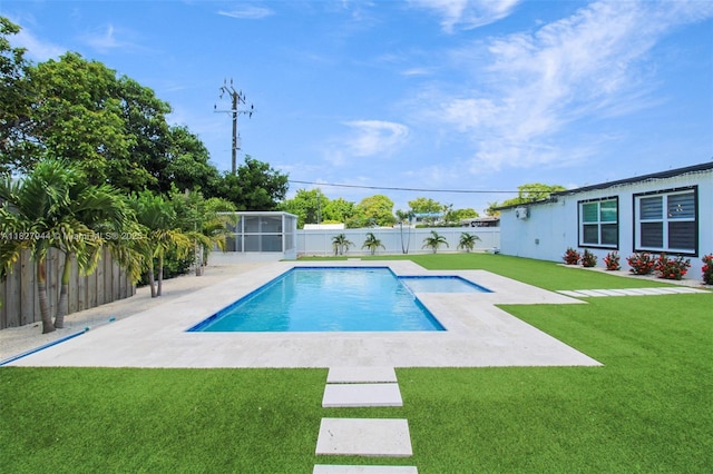 7460 NW 1st Ct, Pembroke Pines, FL 33024 - view of pool with a fenced backyard, a sunroom, and a patio area