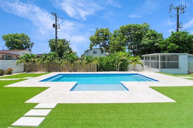 7460 NW 1st Ct, Pembroke Pines, FL 33024 - view of pool featuring a patio area, a sunroom, and a fenced backyard