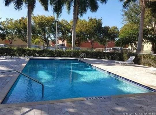 8430 SW 8th St Unit 606B, Miami, FL 33144 - community pool featuring a patio area