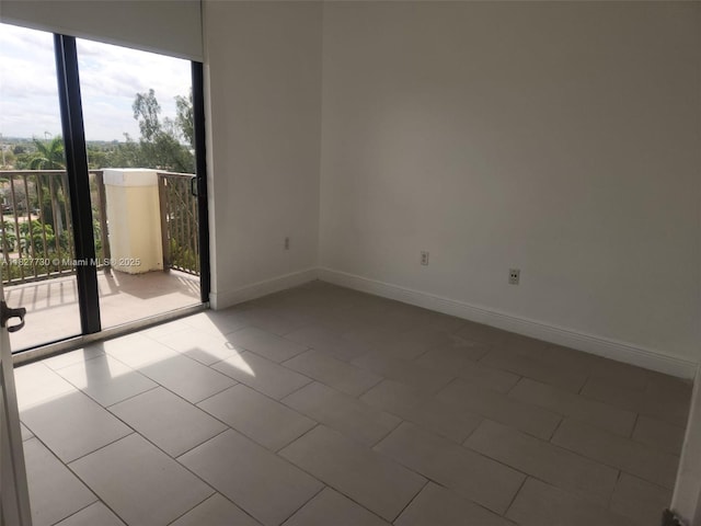 8430 SW 8th St Unit 606B, Miami, FL 33144 - empty room featuring baseboards and tile patterned flooring