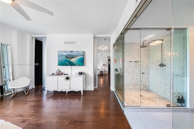 720 NE 62nd St Unit 403, Miami, FL 33138 - living area with wood finished floors and a ceiling fan