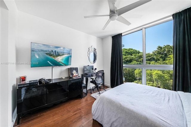 720 NE 62nd St Unit 403, Miami, FL 33138 - bedroom featuring wood finished floors, ceiling fan, and an office area
