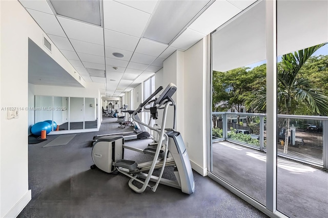 720 NE 62nd St Unit 403, Miami, FL 33138 - gym featuring plenty of natural light and a paneled ceiling