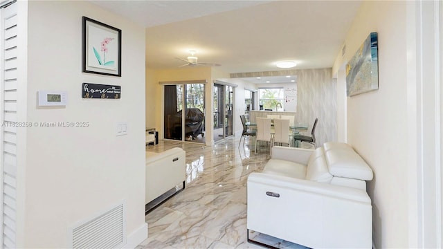 889 Hamilton Dr Unit 889B, Homestead, FL 33034 - living area with light marble finish floors and a ceiling fan