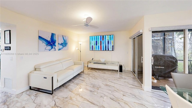 889 Hamilton Dr Unit 889B, Homestead, FL 33034 - living area featuring a ceiling fan and marble finish flooring