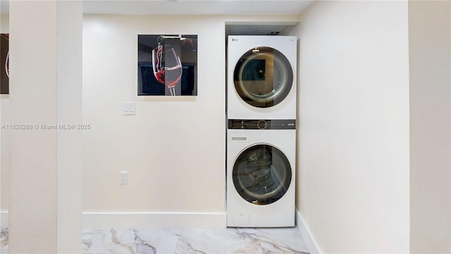 889 Hamilton Dr Unit 889B, Homestead, FL 33034 - washroom featuring stacked washer and clothes dryer and marble finish floors