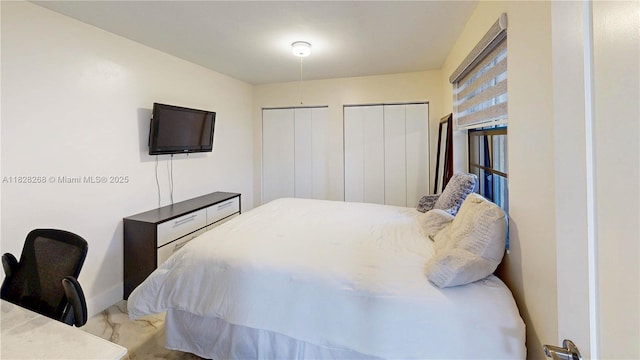 889 Hamilton Dr Unit 889B, Homestead, FL 33034 - bedroom featuring two closets and marble finish floors