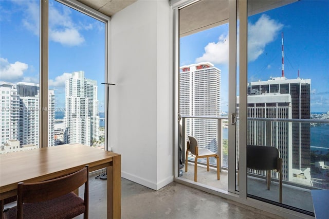 151 SE 1st St Unit 3102, Miami, FL 33131 - office space with finished concrete floors, a city view, and floor to ceiling windows