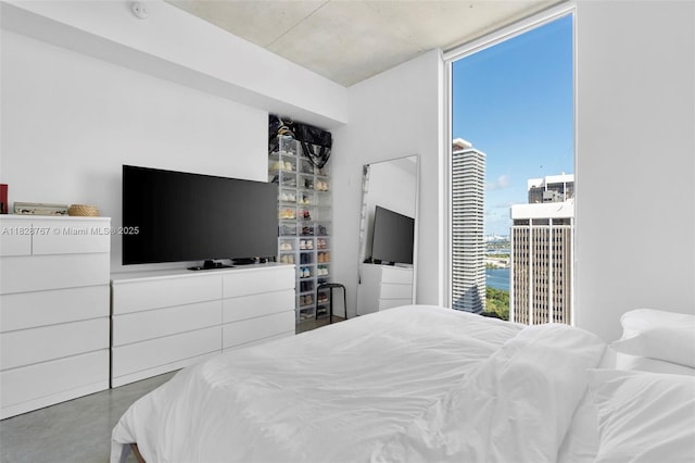 151 SE 1st St Unit 3102, Miami, FL 33131 - bedroom with finished concrete floors and expansive windows