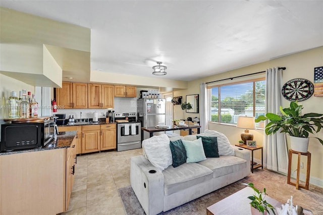 2435 Wilson St, Hollywood, FL 33020 - living room with light tile patterned floors